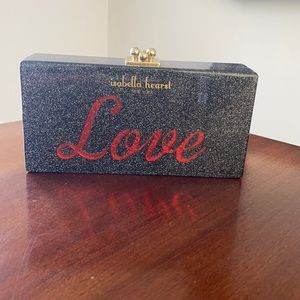 Isabella Hearst clutch acrylic with love on front 8x4x2